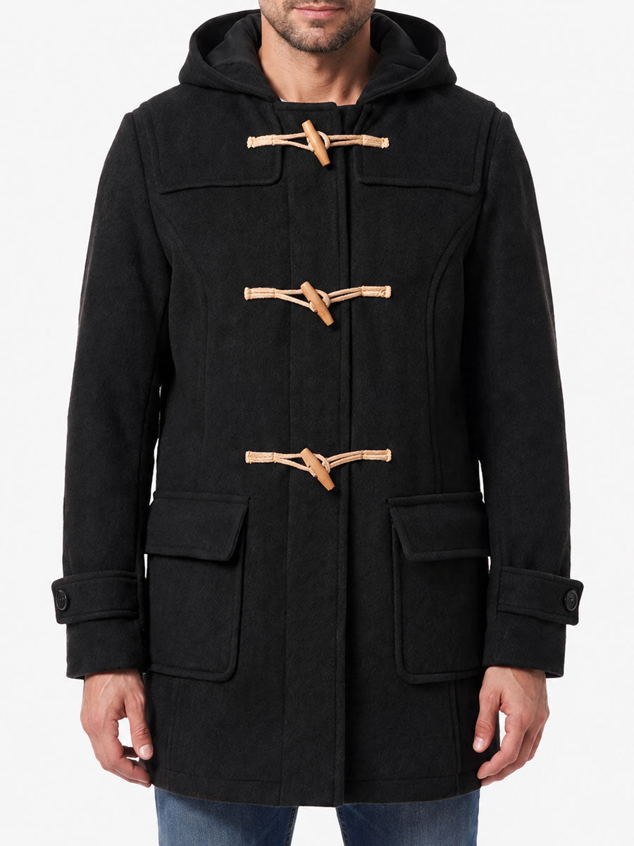 Front view of black wool blend hooded duffle coat with wooden toggle and loop fastenings, attached hood, and two flap pockets.
